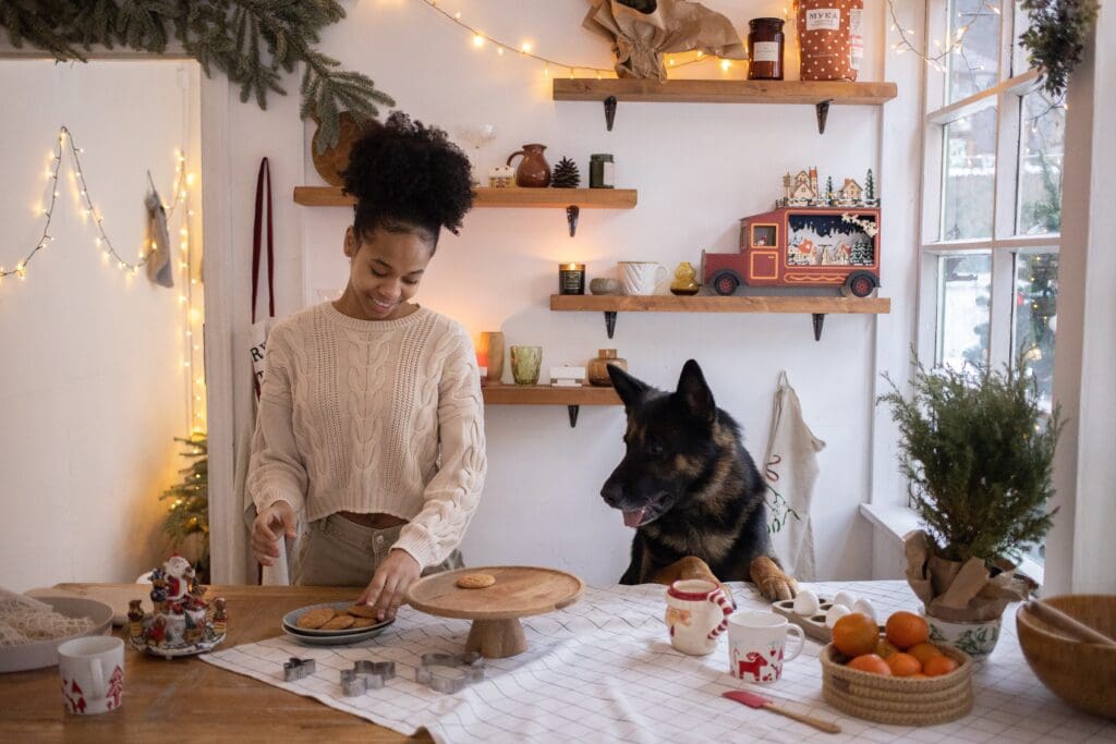 Woman and dog in kitchen