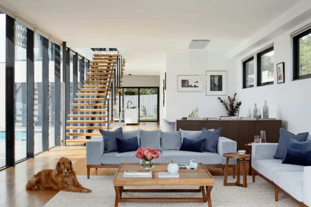 brown wooden coffee table near gray couch