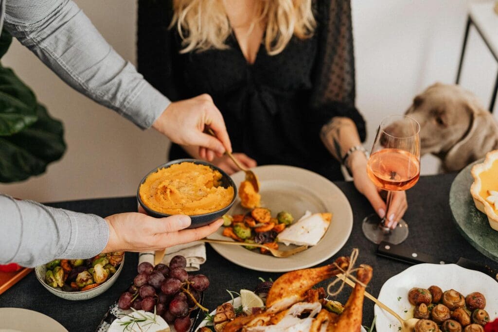 A cozy dinner scene featuring a variety of delicious dishes and a relaxing atmosphere.